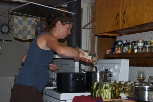 Sarah slaving over the canner